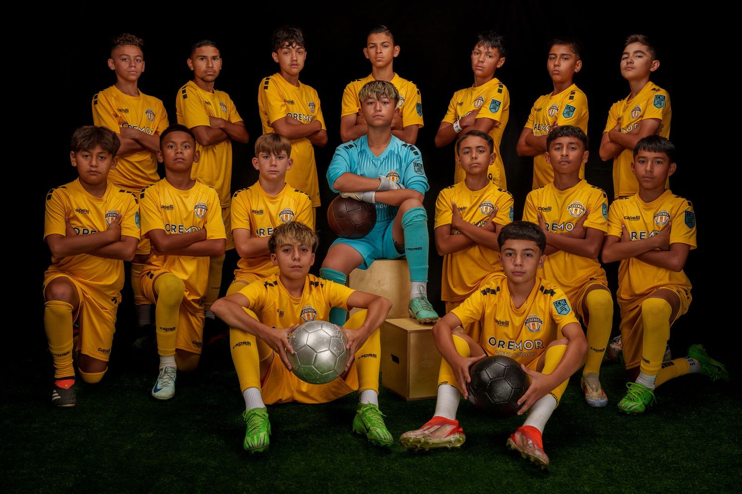 Group photos of youth soccer players in bright yellow uniforms sitting together on benches for team portraits.