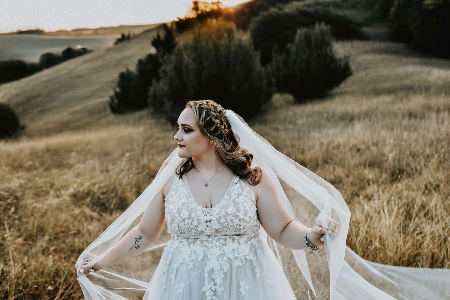 Sunset bridal portrait in Corinth, Texas with bride in flowing cathedral veil and vintage heels.