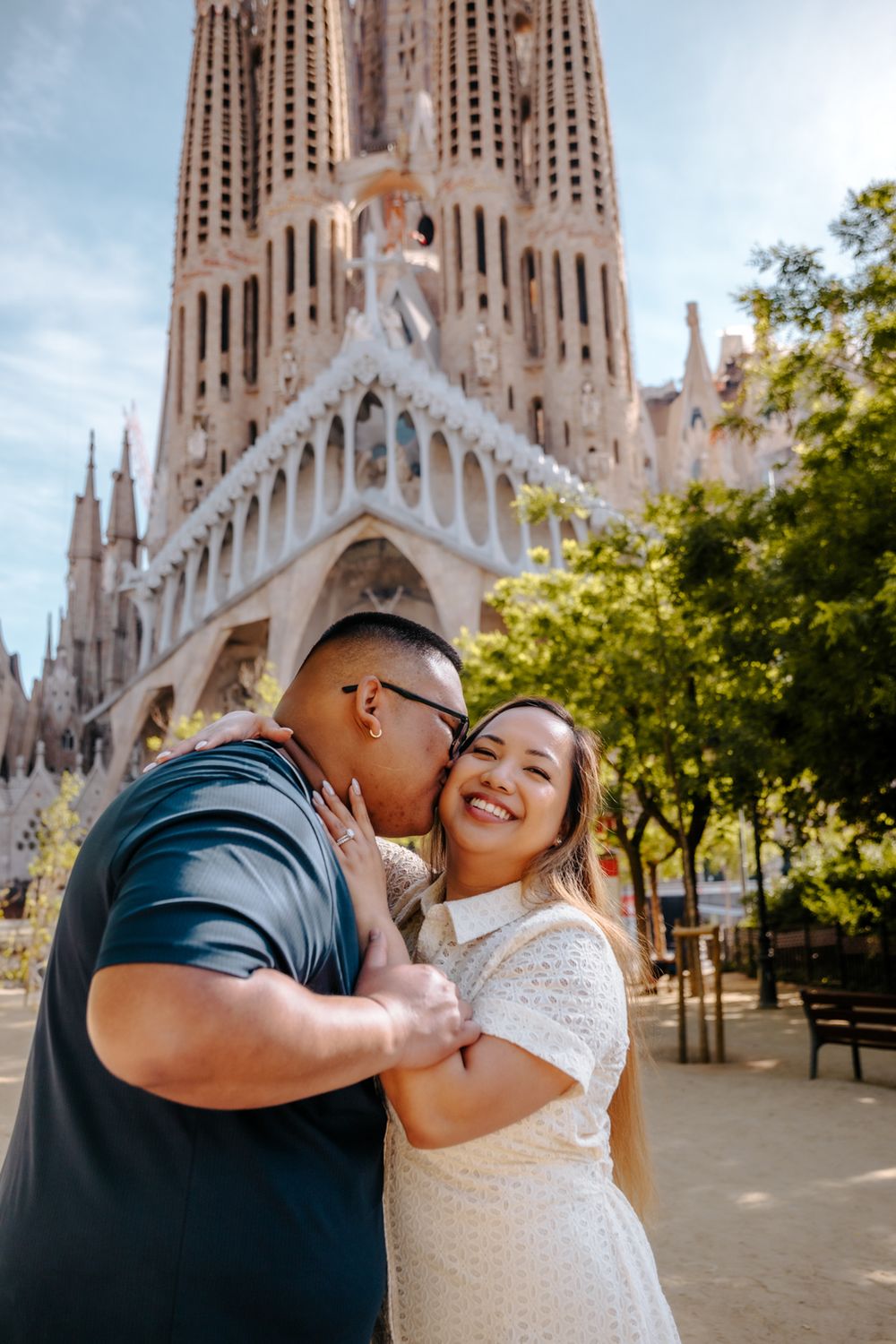 Candid laughter of the couple during their honeymoon photoshoot in Barcelona.