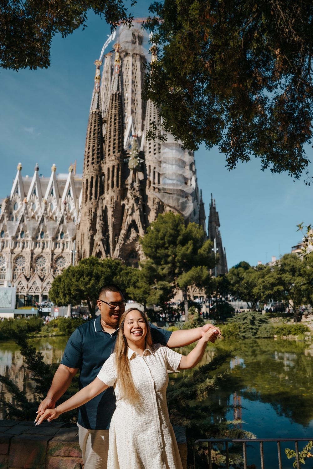 Couple walking together inside the iconic basilica during their honeymoon session.