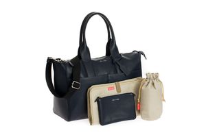 Black and beige leather handbag collection featuring various styles and sizes displayed on white background.