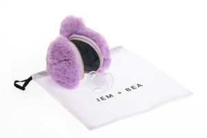 Purple and white gaming headset with plush ear cushions and adjustable microphone shown from multiple angles.