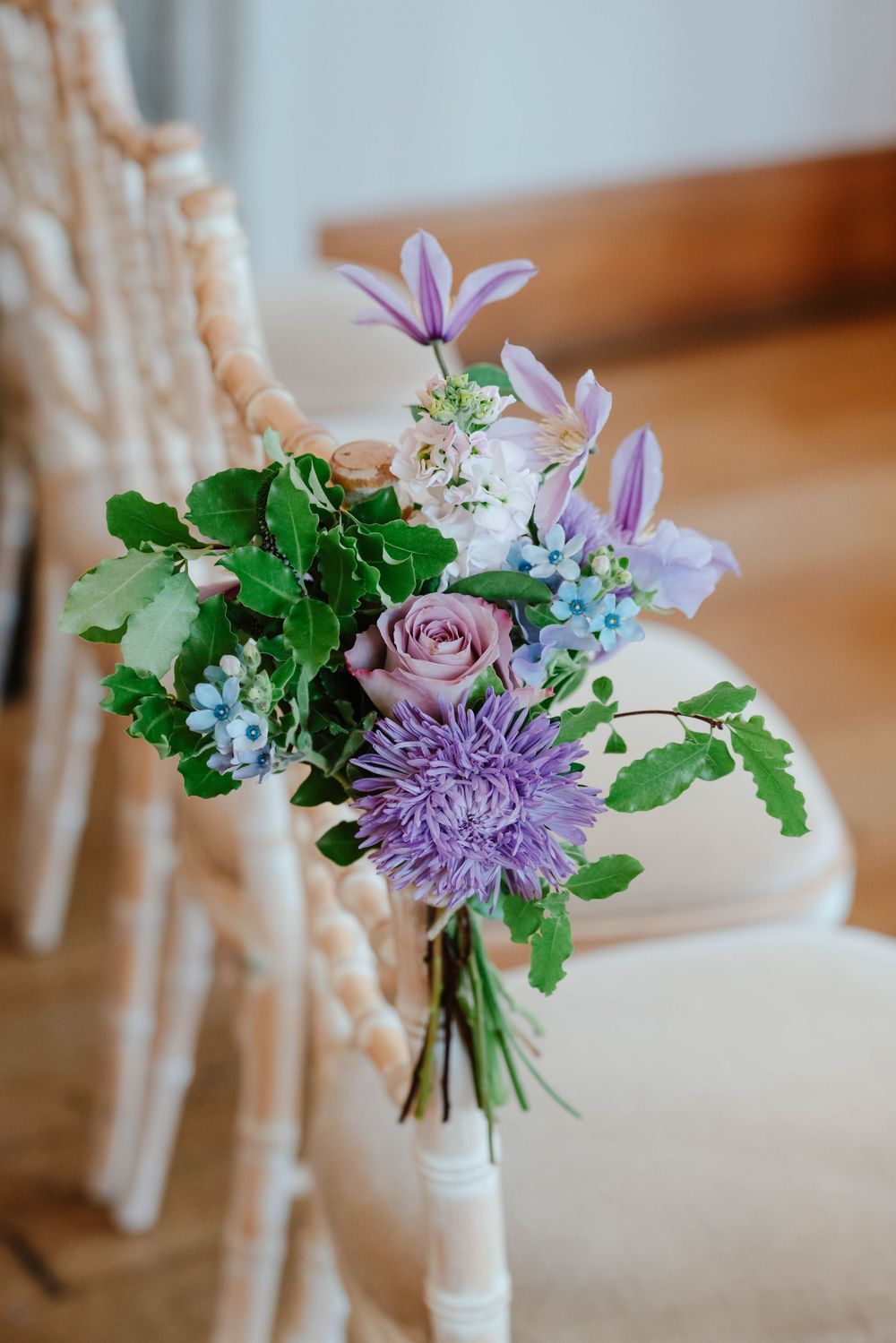 Coombe Lodge Somerset Wedding Photographer Zara Davis Photography flowers on aisle seats