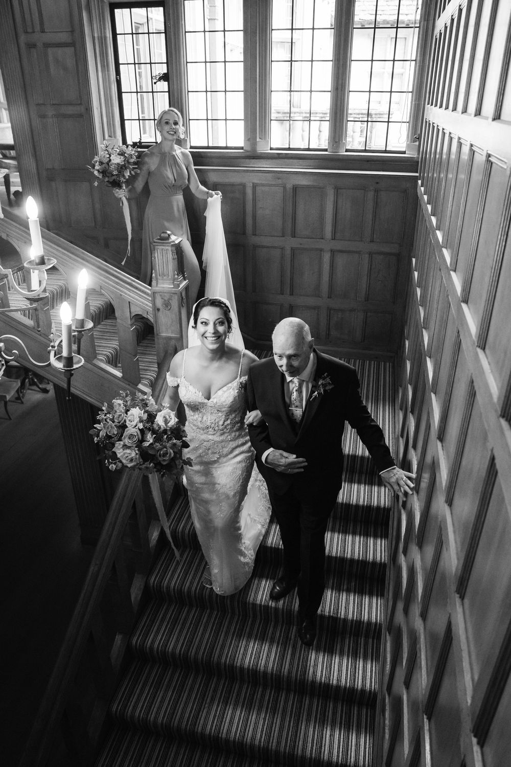 Coombe Lodge Somerset Wedding Photographer Zara Davis Photography black and white father walking bride daughter down stairs