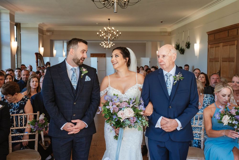 Coombe Lodge Somerset Wedding Photographer Zara Davis Photography bride seeing groom at the alter music room