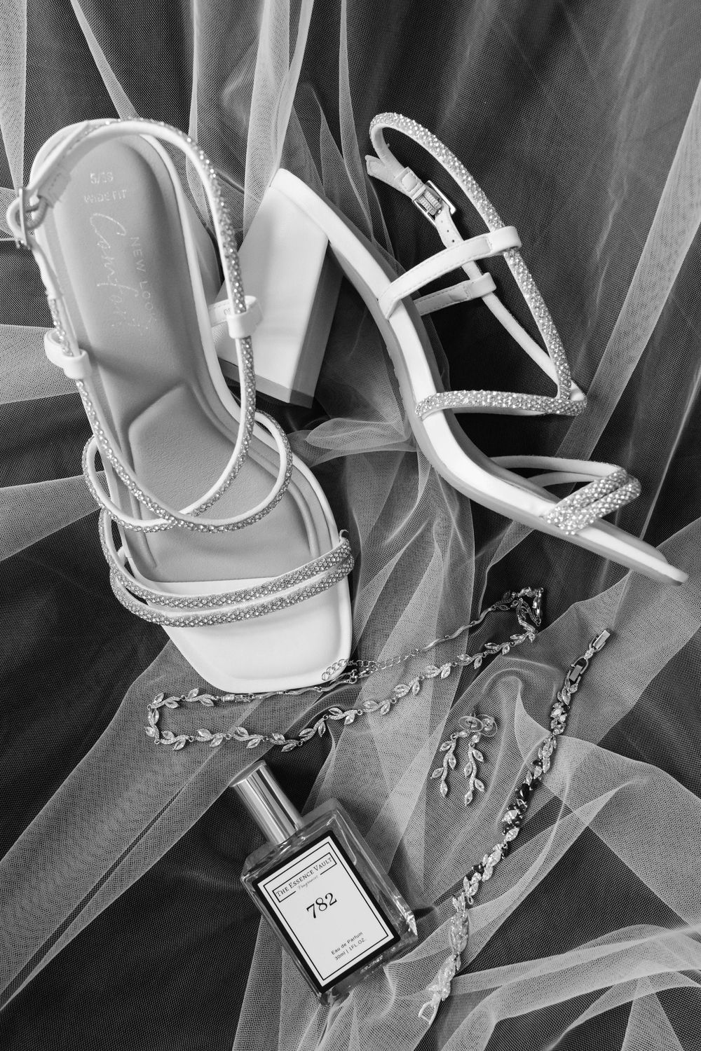 Coombe Lodge Somerset Wedding Photographer Zara Davis Photography black and white of bridal accessories