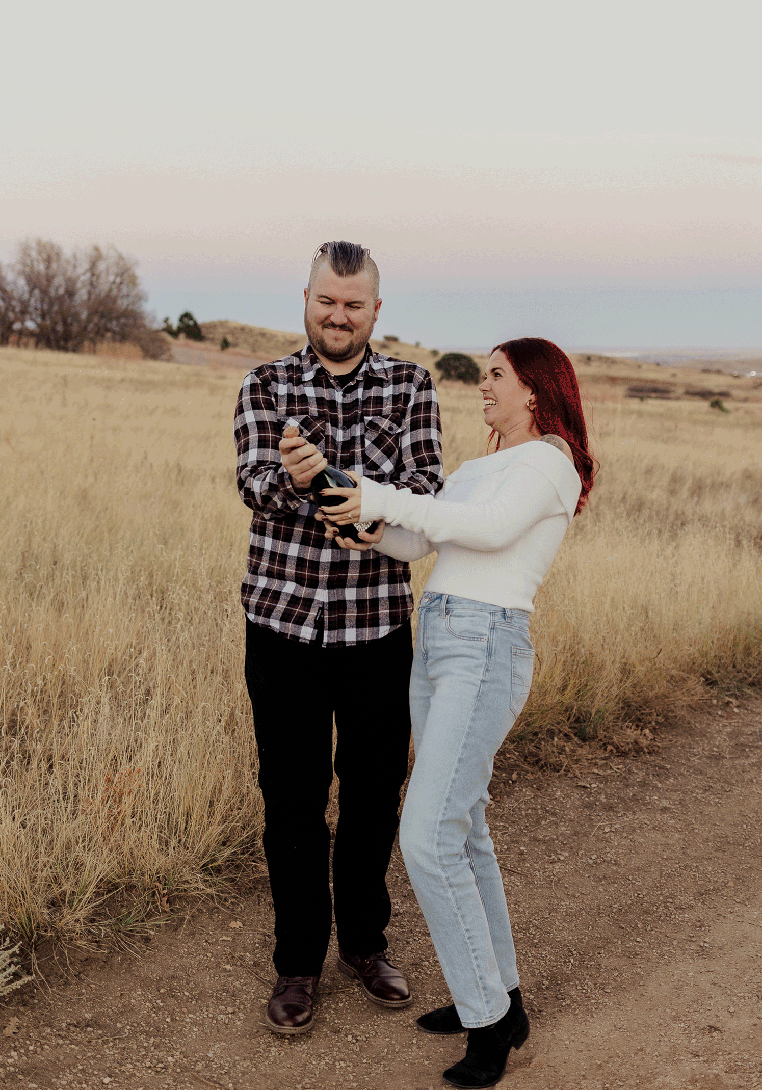 A series of outdoor portraits showing a couple dancing together in a field at sunset against a golden grass backdrop.