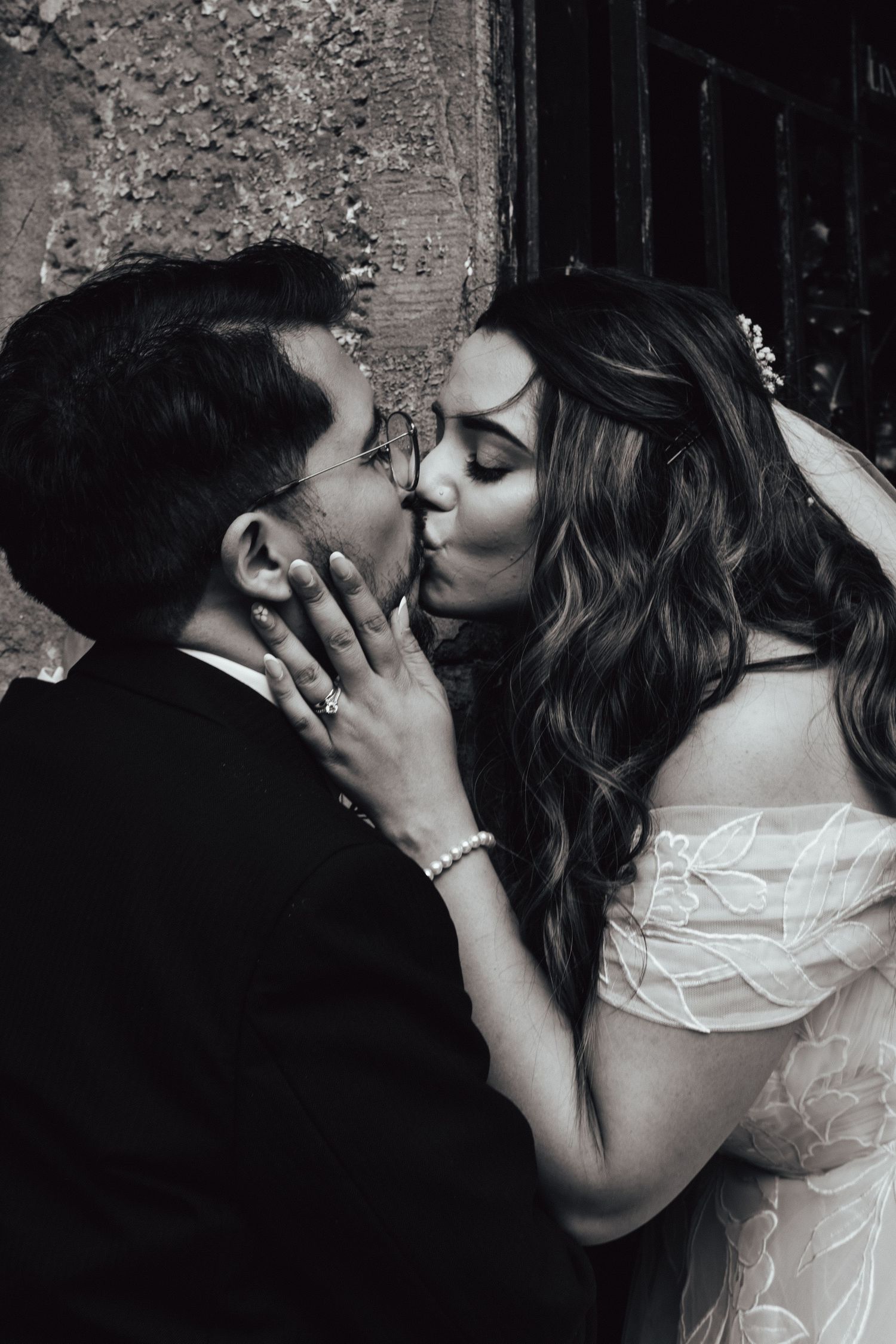 Romantic wedding photo of bride and groom sharing a kiss in Dundee by Scottish Wedding photographer