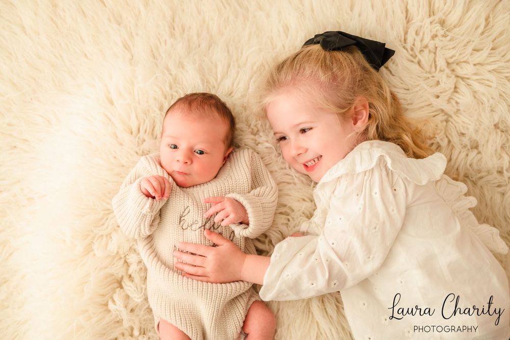 Sheffield Photographer family shoot. plain backdrop style. Newborn shoot