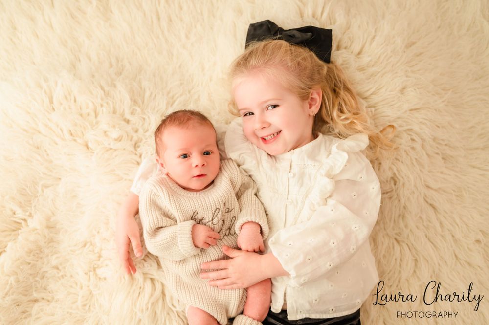 Sheffield Photographer family shoot. plain backdrop style. Newborn shoot