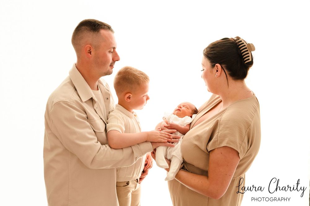 Sheffield Photographer family shoot. plain backdrop style. Newborn shoot