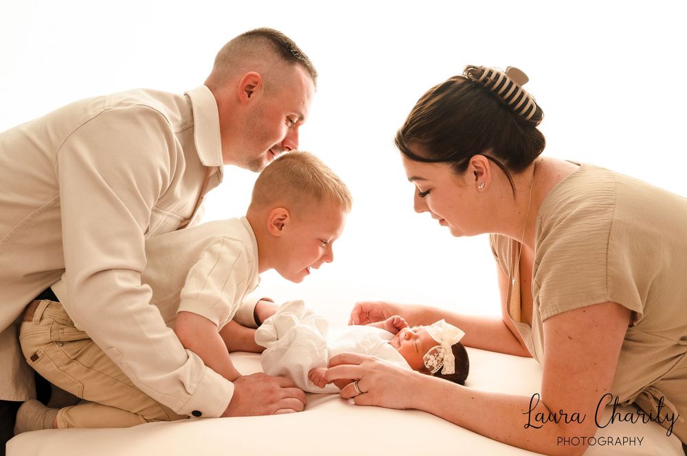 Sheffield Photographer family shoot. plain backdrop style. Newborn shoot