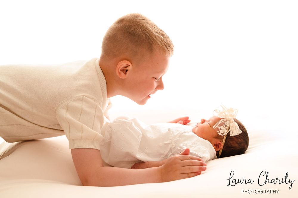 Sheffield Photographer family shoot. plain backdrop style. Newborn shoot