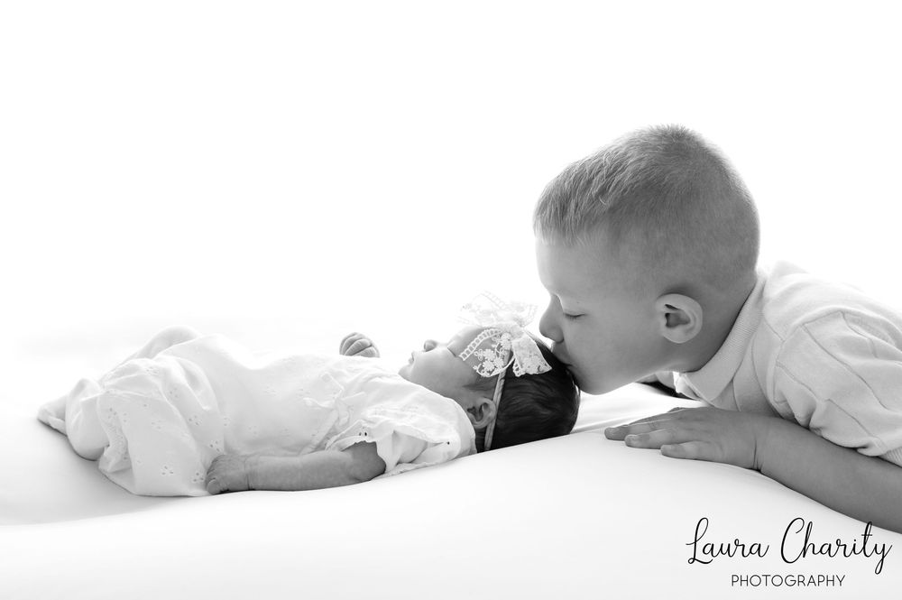 Sheffield Photographer family shoot. plain backdrop style. Newborn shoot