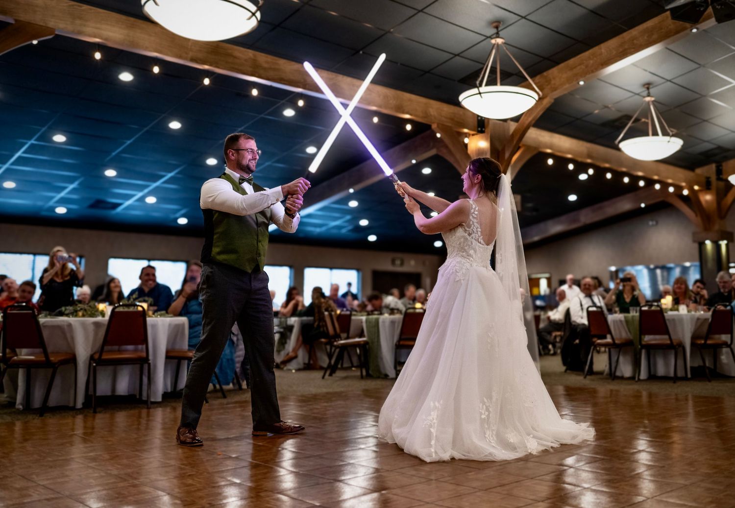 A large Star Wars themed church wedding in the foothills at Miwuk, California, where the bride and groom brandished light sabers!