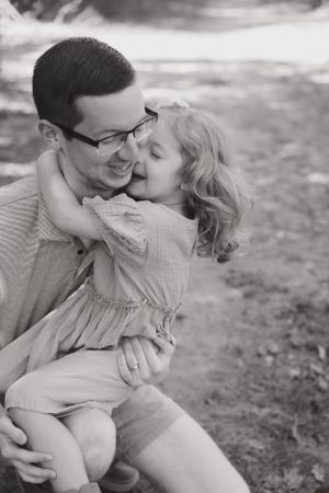 Intimate couple portrait session showing tender moments on a beach.
