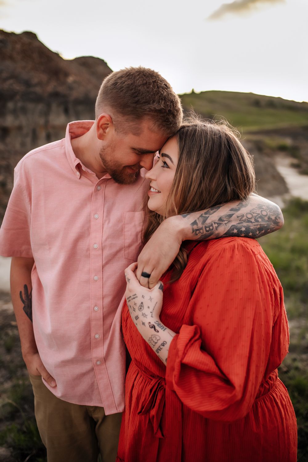 Couples photo during a family session at Painted Canyon in Theodore Roosevelt National Park - lifestyle photographer serving southwest ND