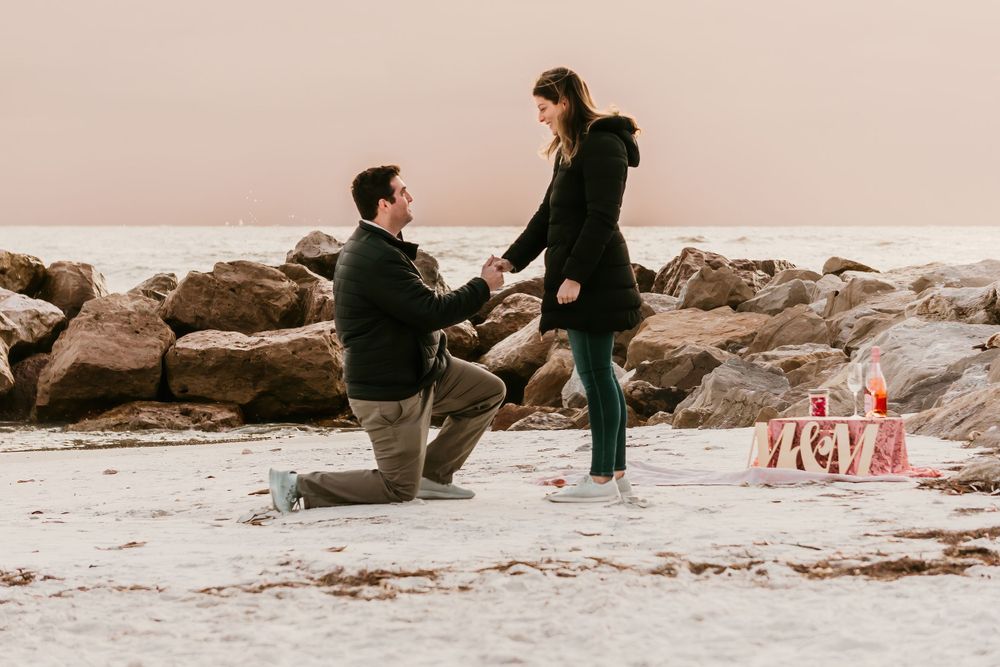 Proposal Session at Sunset Upham Beach Saint Petersburg, FL at Sunset; Man proposing to woman