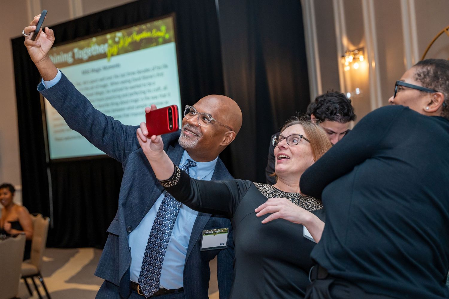 Business professionals networking and interacting at a conference or seminar.