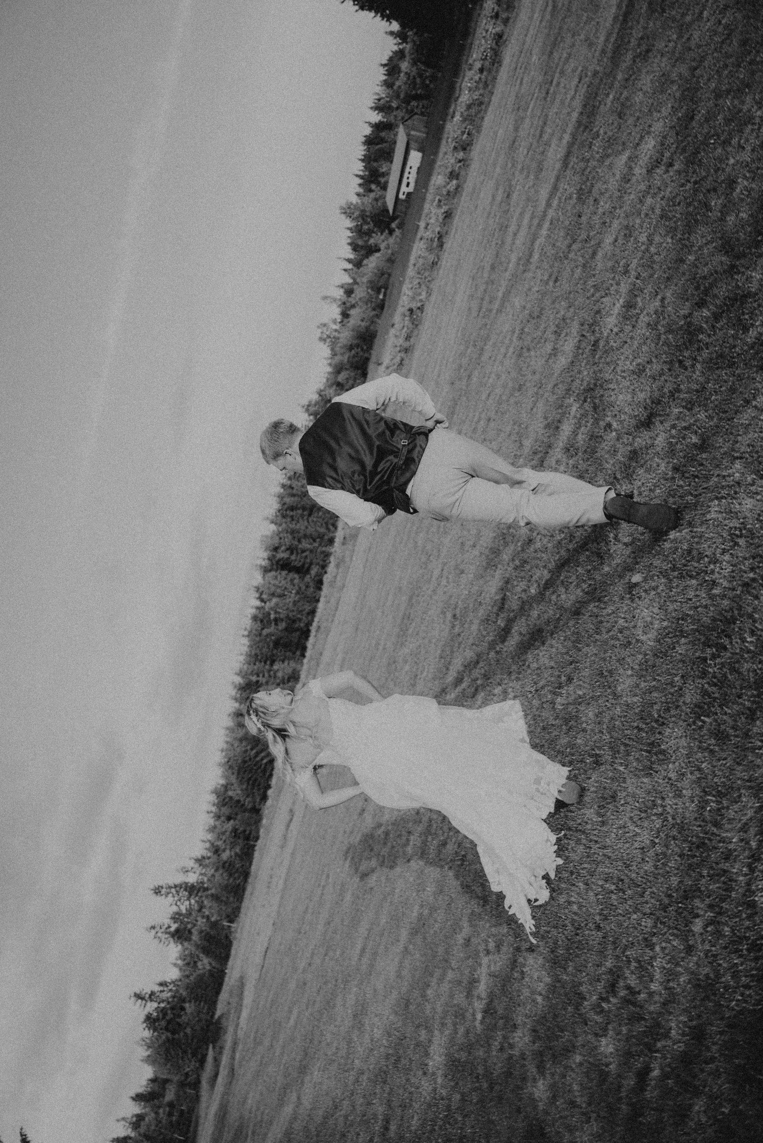 Black and white photo sequence showing someone in a flowing white dress spinning in an outdoor field.