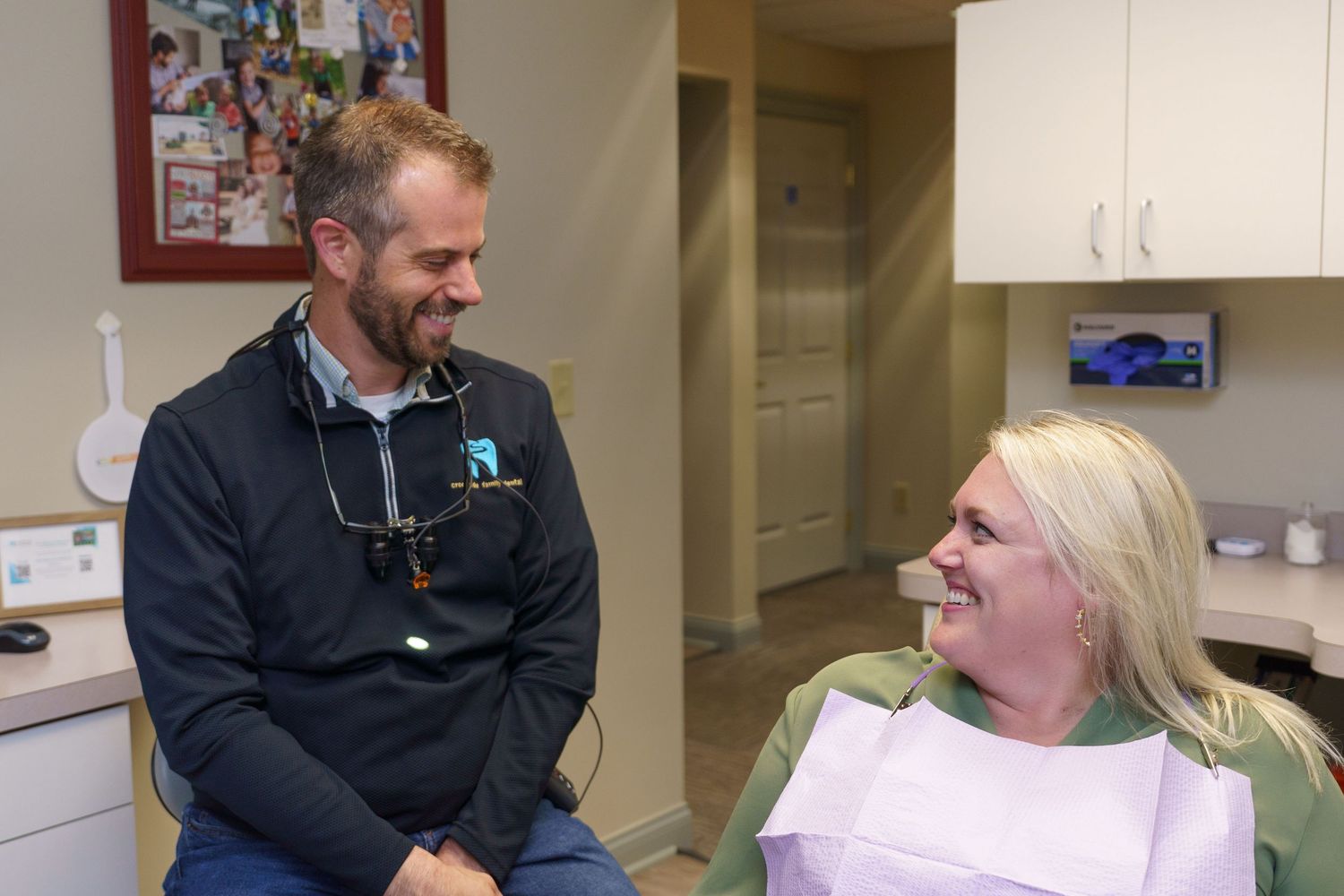 Dentist talking with a patient during a branding photography session, by Jamie Macey Photography in Columbus, Ohio.