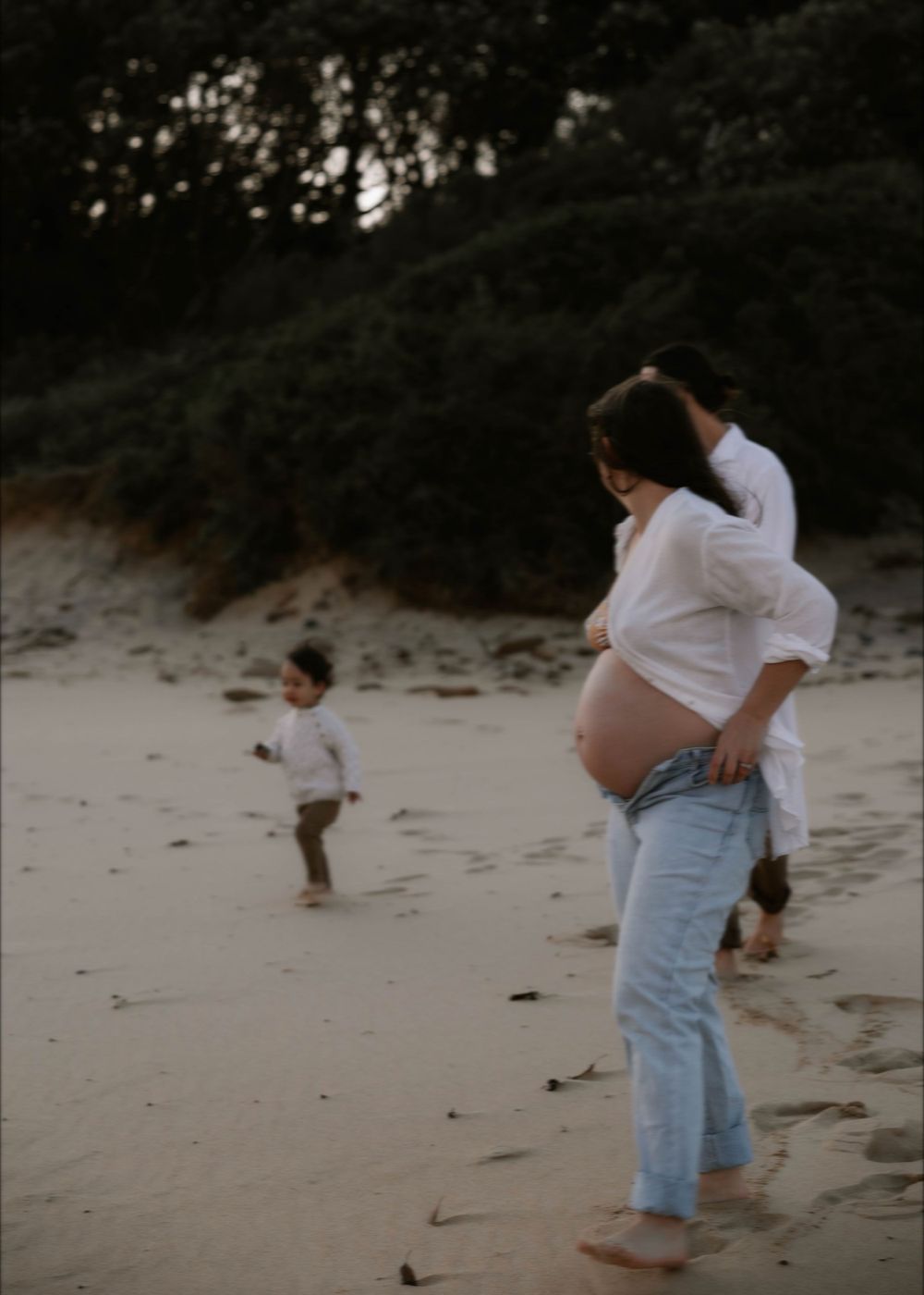 Maternity family photoshoot at sunset with pregnant mum, toddler, and husband in Bulli - family photography in Woonona and Illawarra.