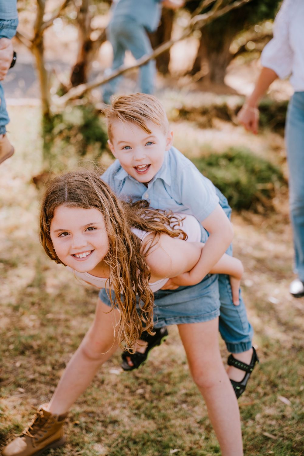 Fun action shots of children playing and laughing in a natural outdoor setting.