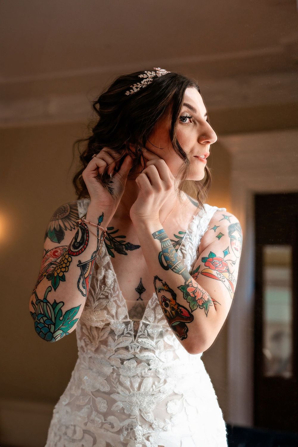 bride fixing her earring