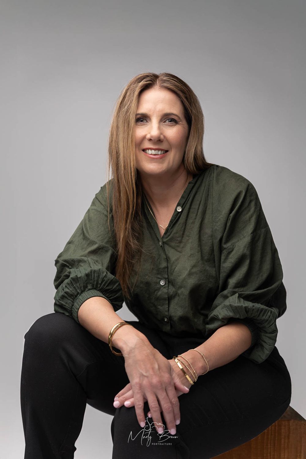 Corporate woman in casual indoor portrait