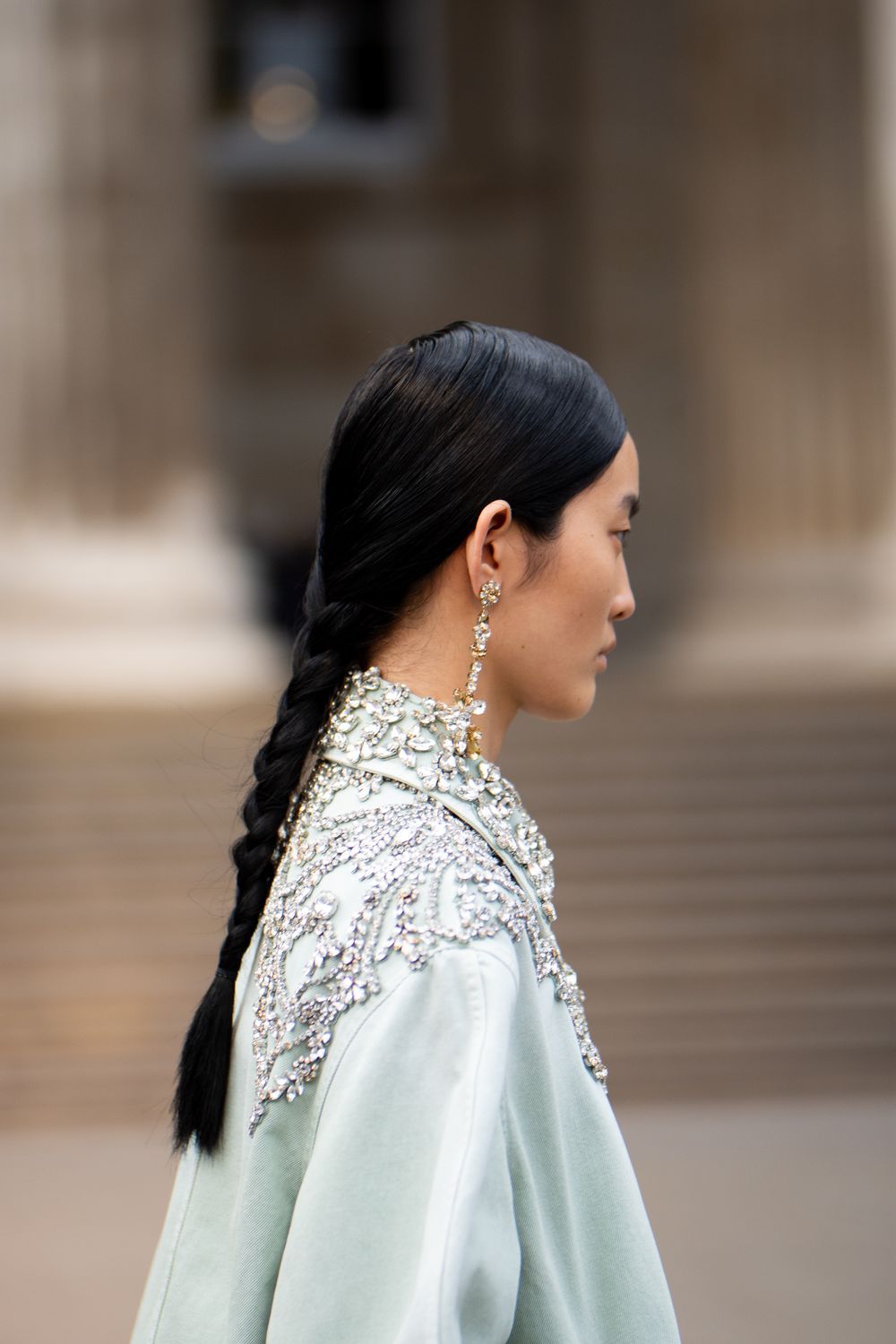 A model in a mint dress walks on a runway during the Erdem fashion show in London, UK.