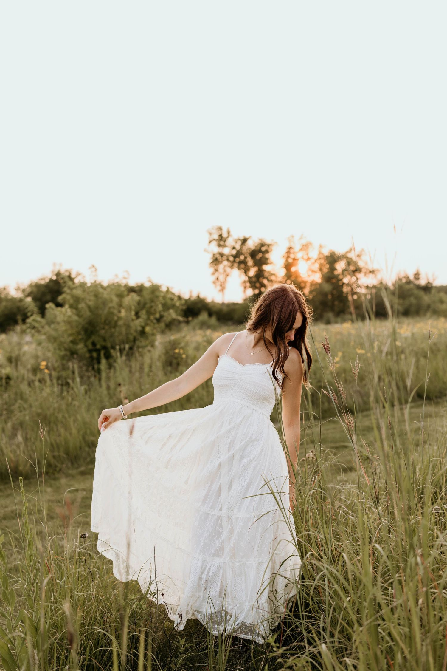 Twin Cities senior photographer takes photo of high school senior at city park in Edina MN.