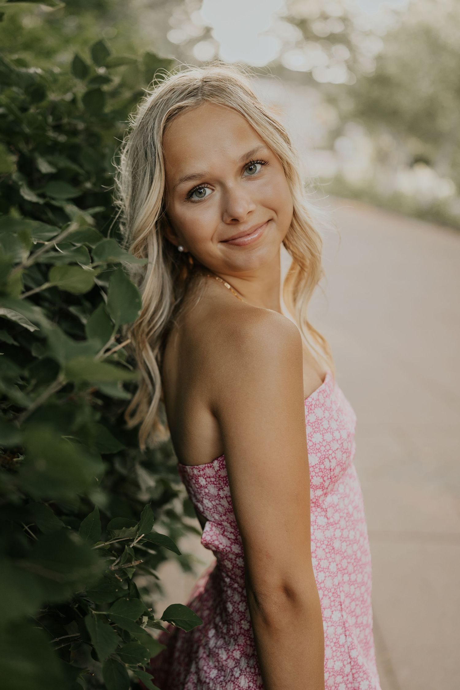 Twin Cities senior photographer takes photo of high school senior at city park in Edina MN.