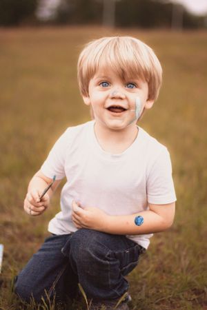Soft golden hour family session in Edmond with playful toddler moments