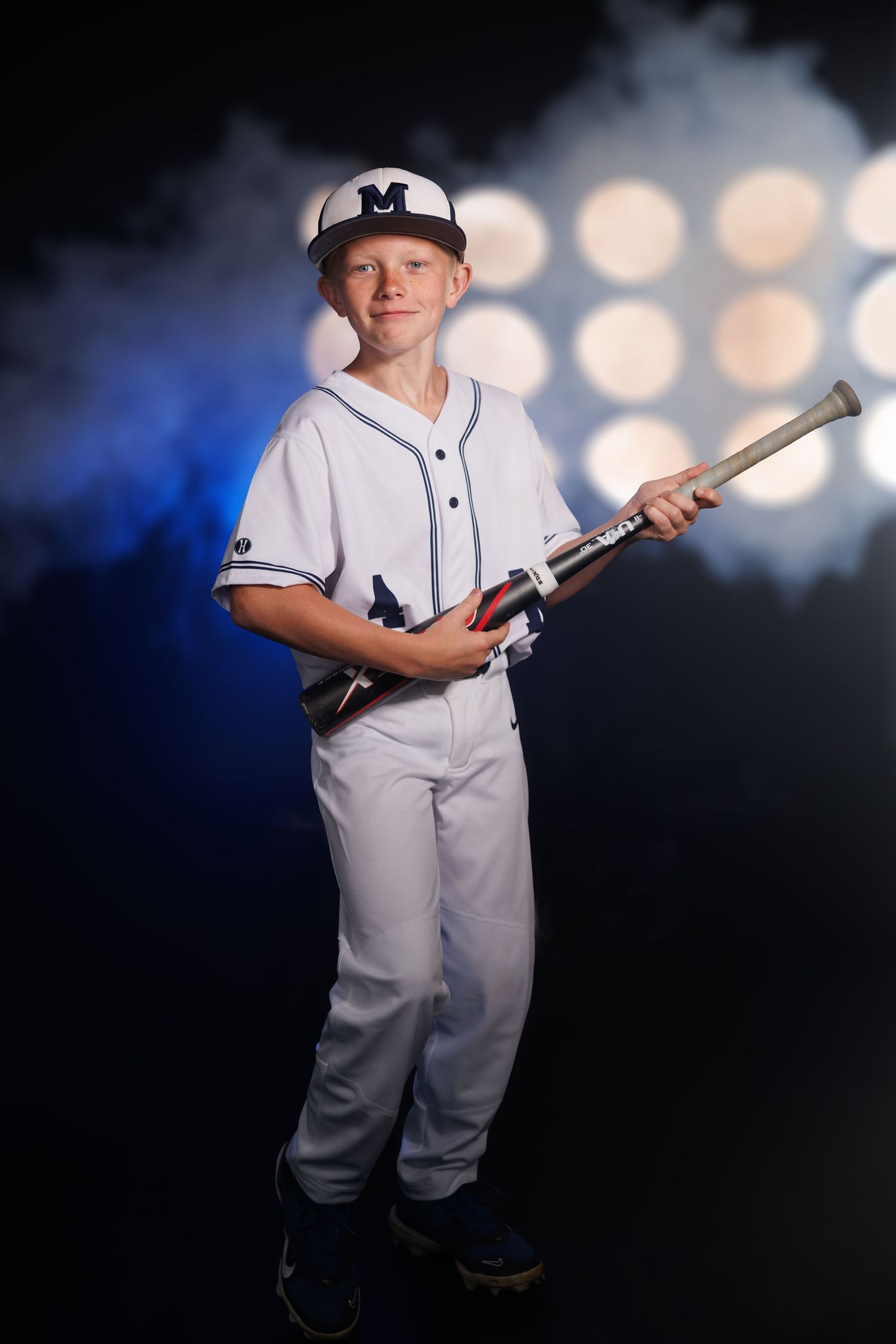 Baseball player playing guitar with his bat