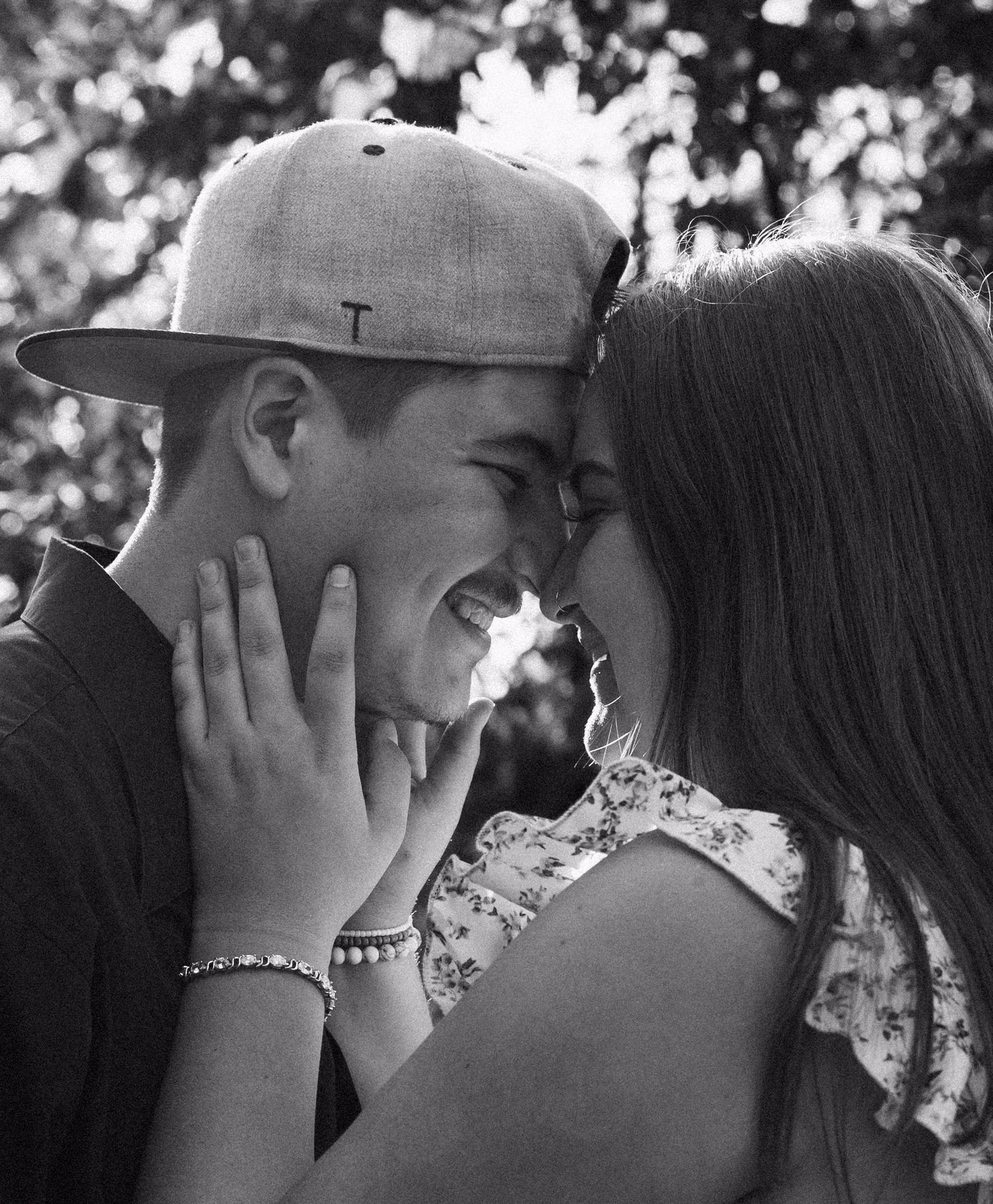 Intimate black and white moment capturing genuine joy and connection.