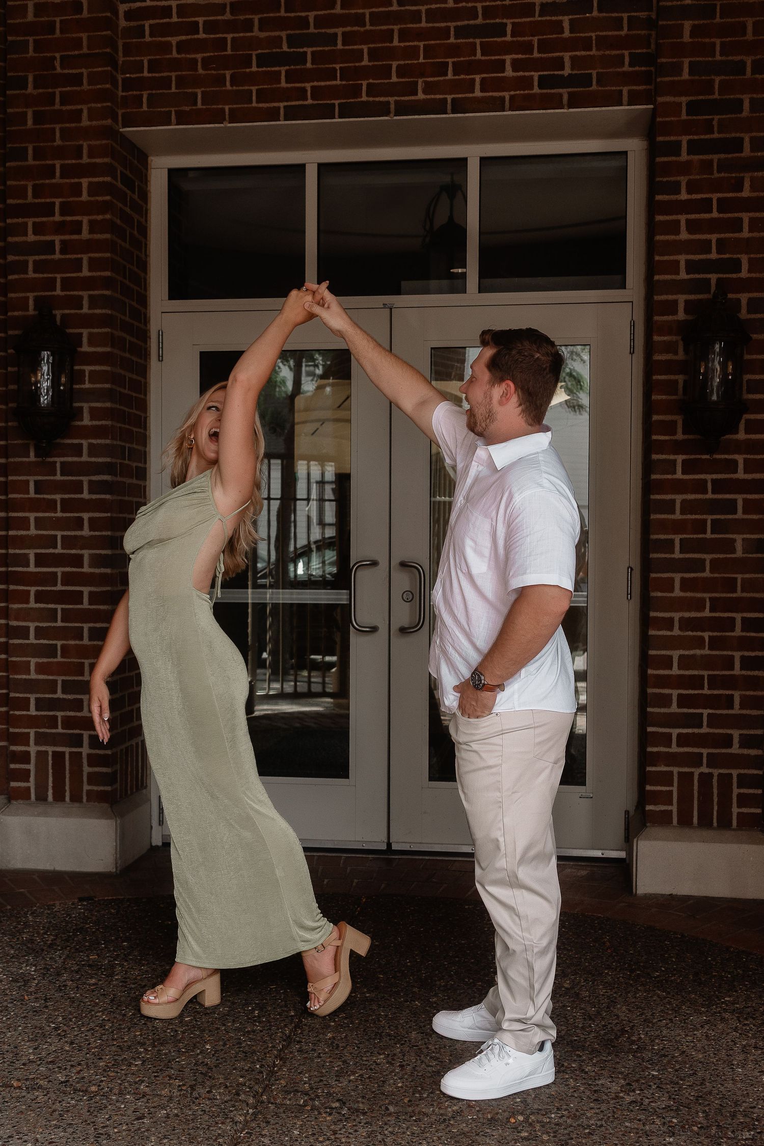 Couple dancing together in front of brick building entrance while demonstrating dance moves in series of photos.