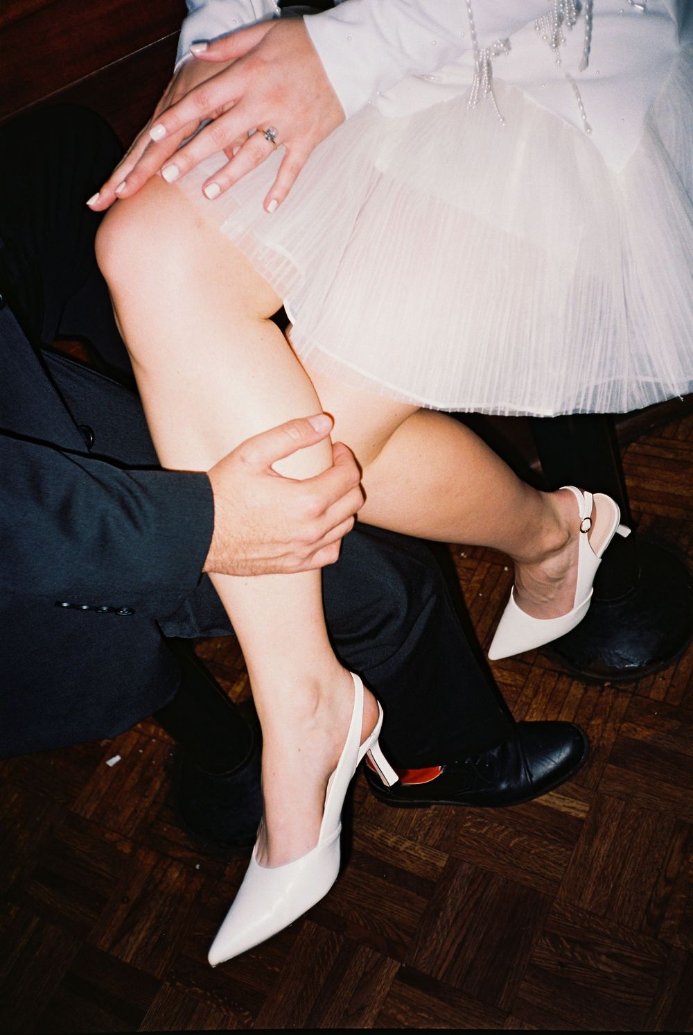 A series of photos showing white bridal shoes and hands helping to put them on during a wedding preparation.