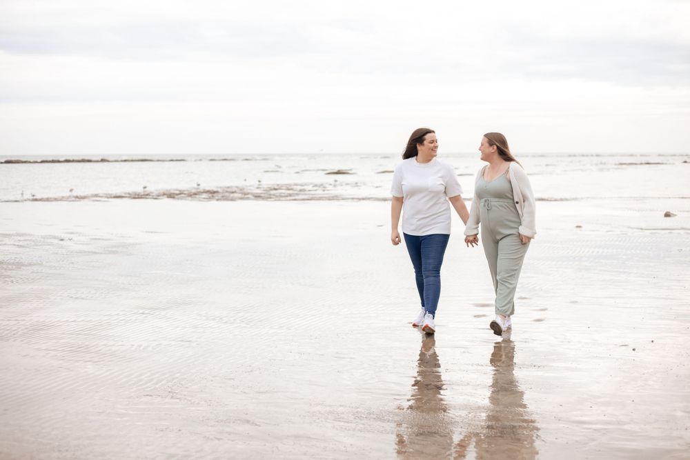 maternity photoshoot with two women on eastbourne beach