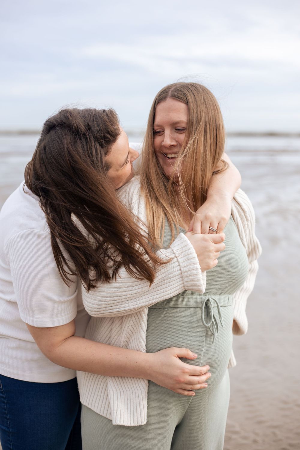 maternity photoshoot with two women on eastbourne beach