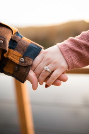 Detail shot of engagement ring in park in Minneapolis Minnesota