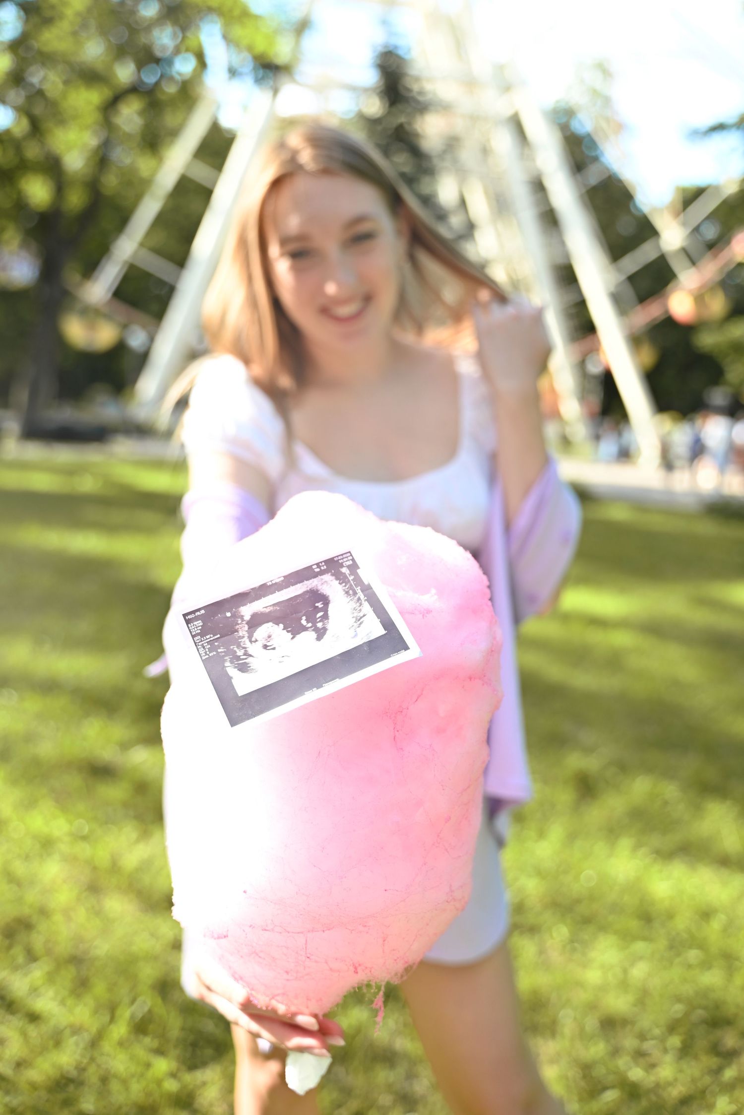 A pregnant woman in a serene park