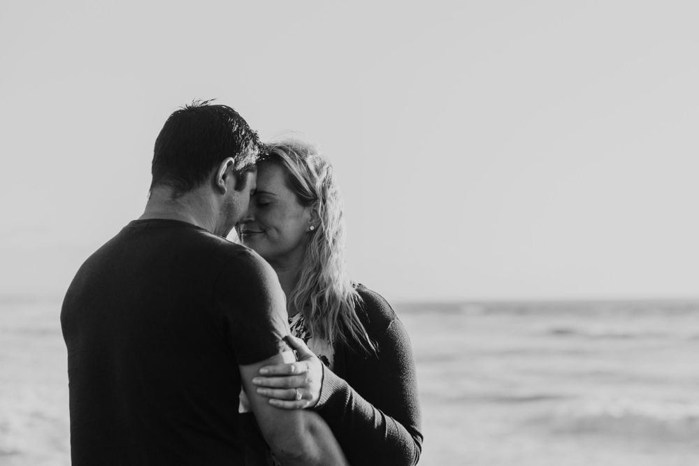 engaged couple sharing a hongi