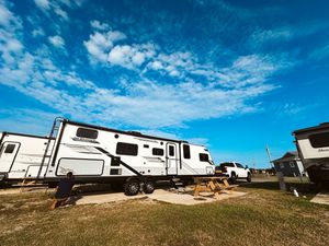 Outdoor family camping setup with our camper, perfect for family moments captured by Urso Photography.