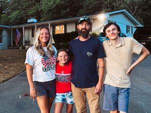 Family photo of Amanda's family on the fourth of July.