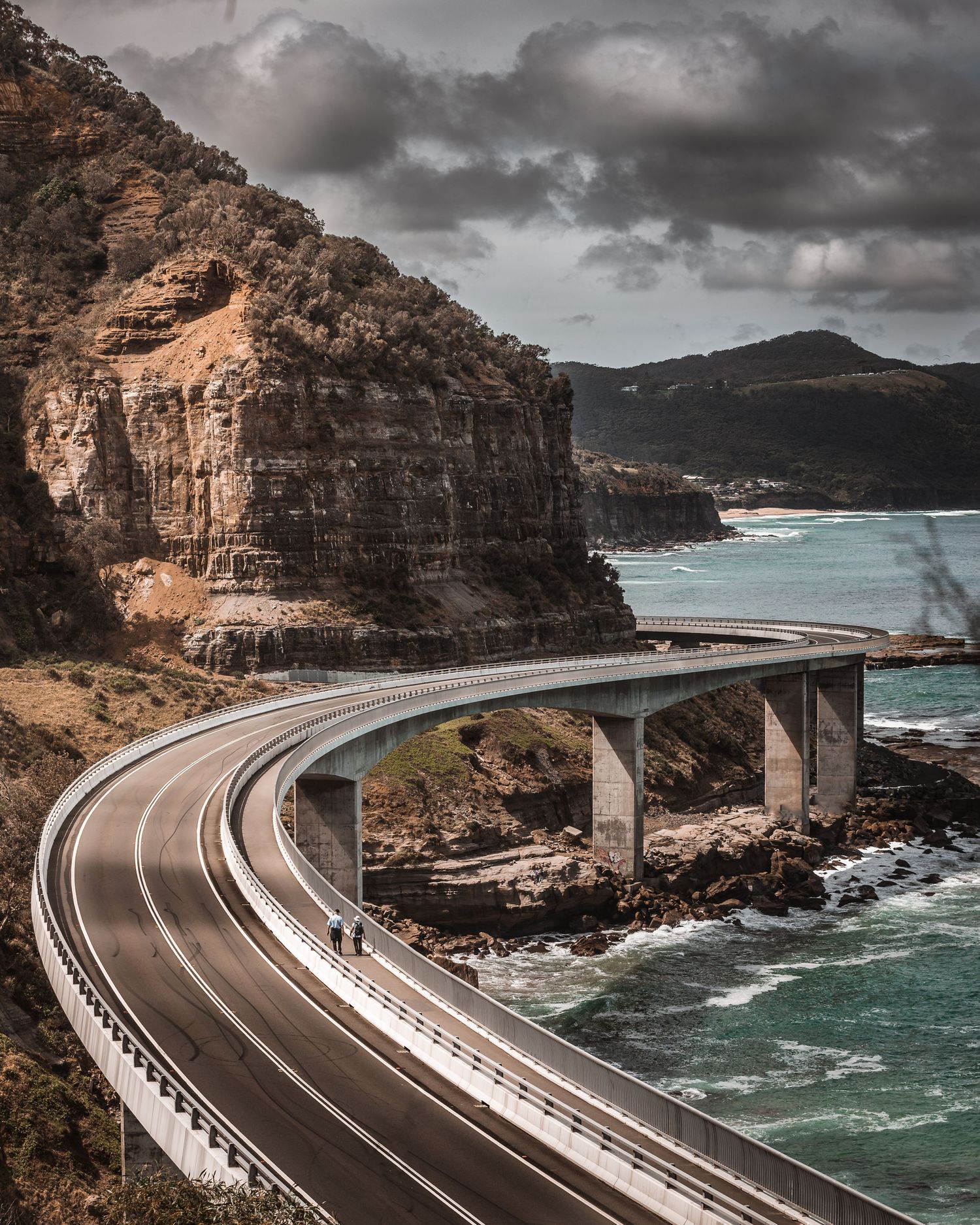 Sea Cliff Bridge winding along dramatic coastal cliffs in New South Wales, Australia.