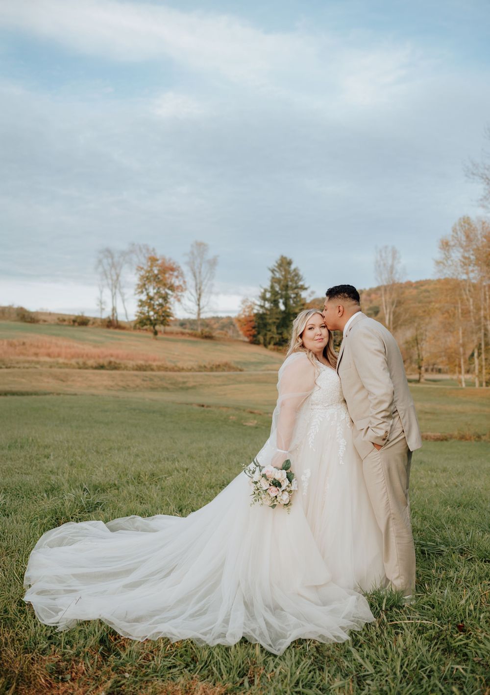 Asheville, NC autumn wedding of couple at modern barn with pond, Spanish-inspired celebration.