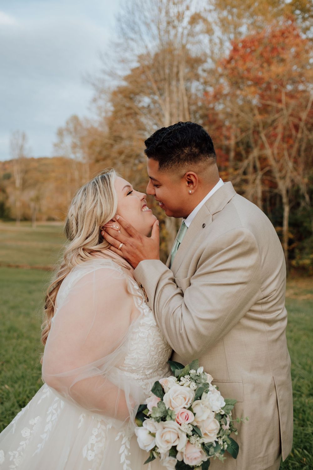 Asheville, NC autumn wedding of couple at modern barn with pond, Spanish-inspired celebration.