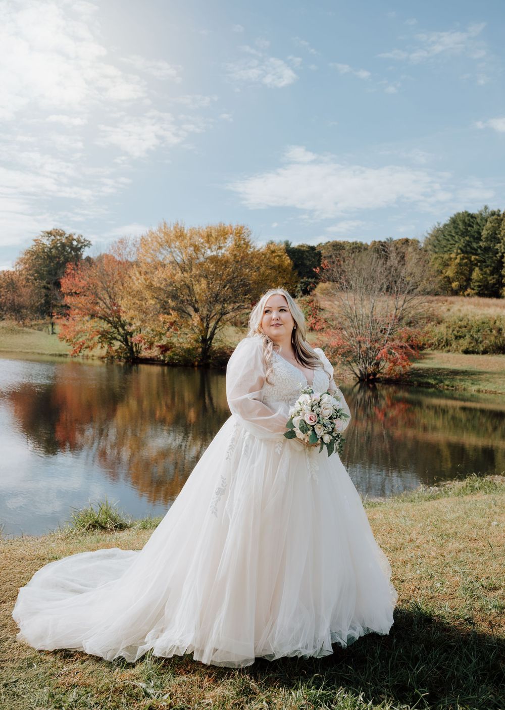 Asheville, NC autumn wedding of couple at modern barn with pond, Spanish-inspired celebration.