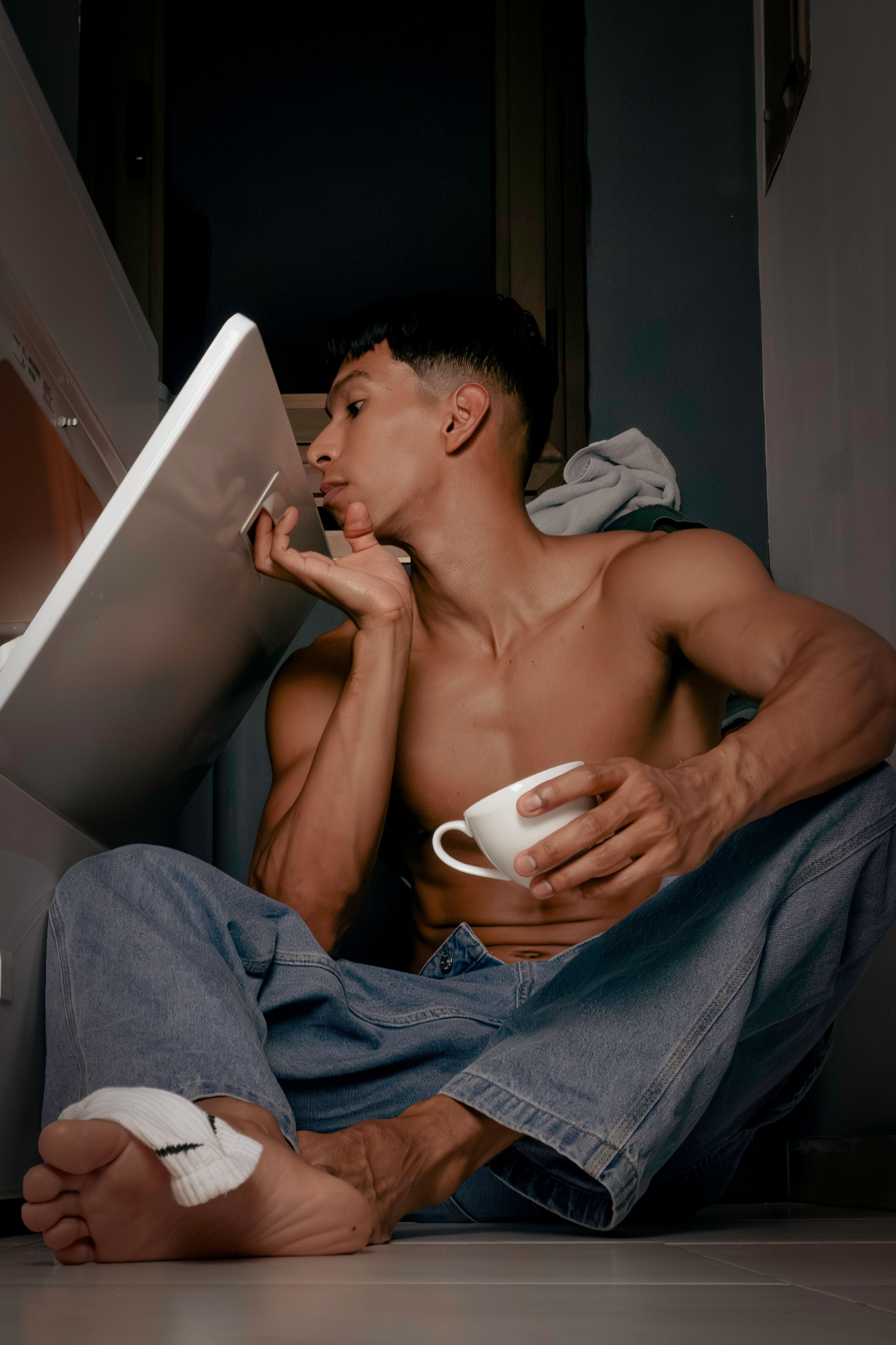 Man on the floor opening dryer