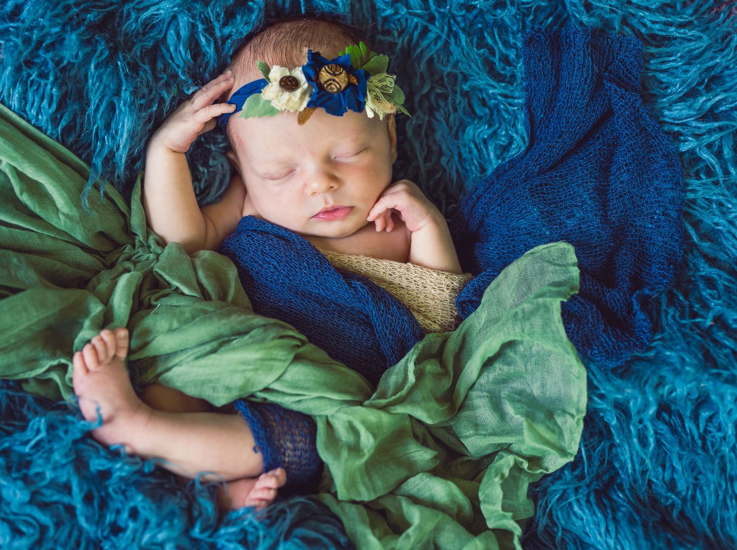 newborn baby girl flowers blue and green creative set natural light pose crochet bonnet Silverhill Alabama Opp Alabama Baldwin County AL